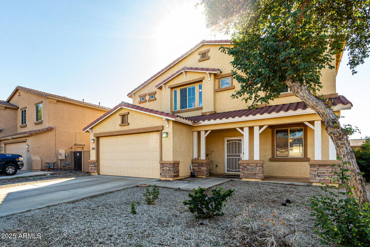 Property Photo:  7313 W Carter Road  AZ 85339 