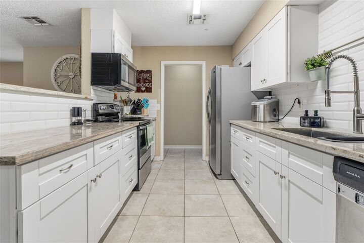 Property Photo:  102 N Bow Drive  TX 77541 