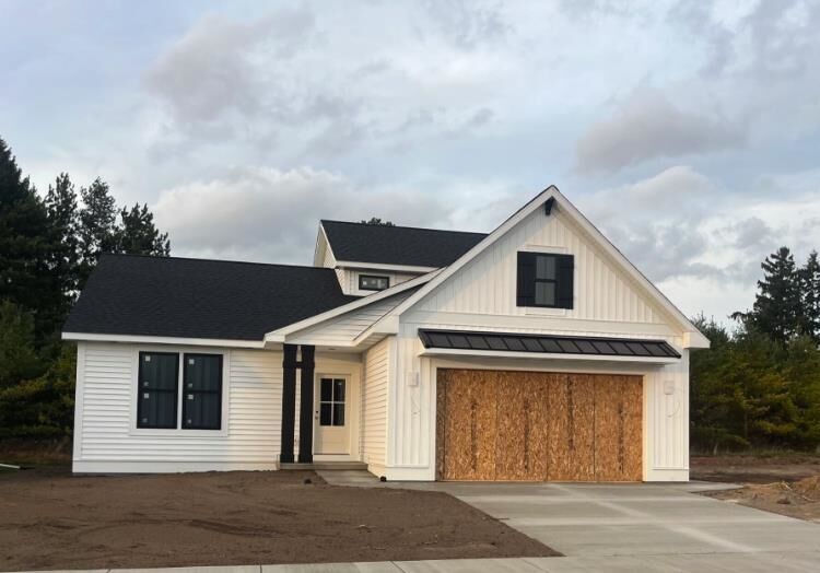 Property Photo:  106 Brass Leaf  MI 48642 