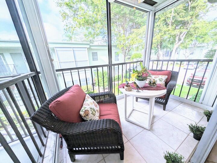 Property Photo:  7515 S Oriole Boulevard NW 203  FL 33446 