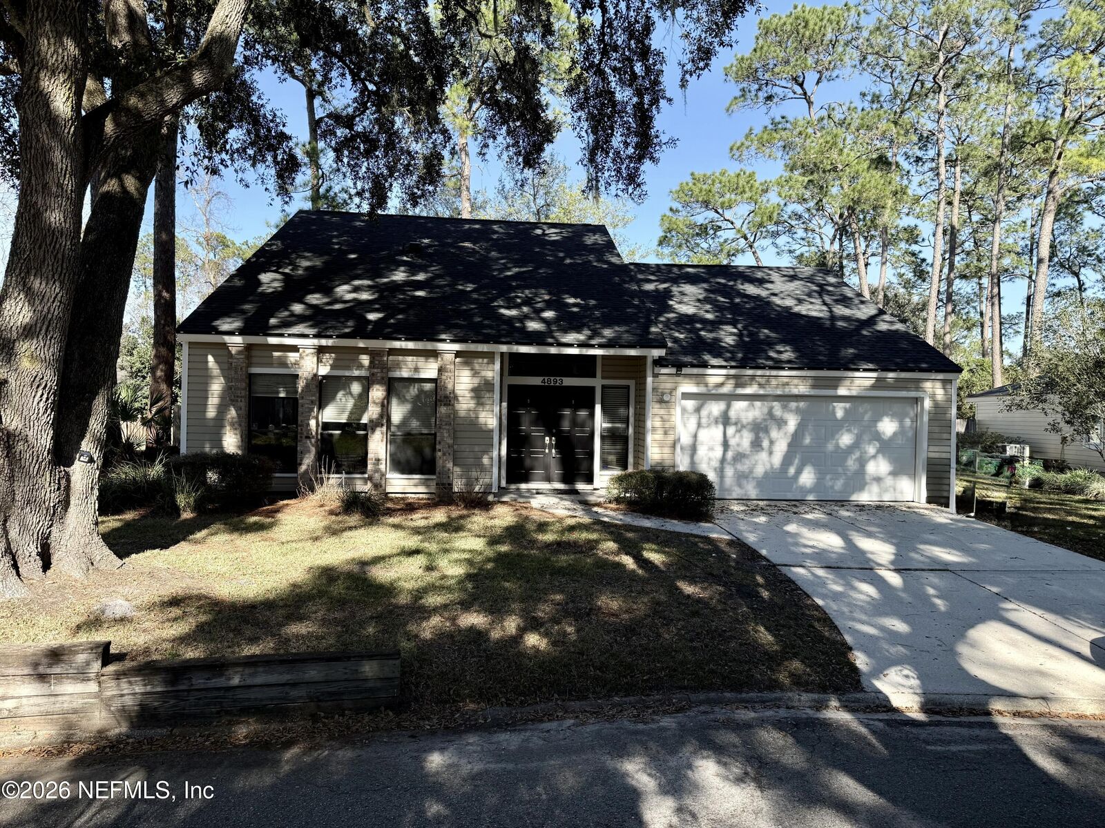 Property Photo: 4893 E Northford Place E FL 32257