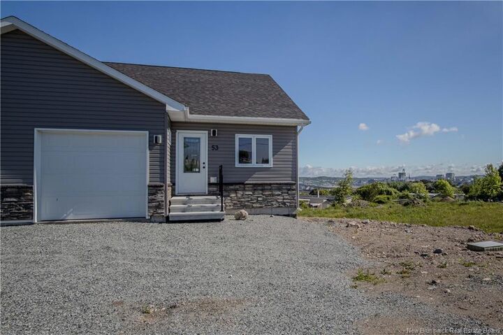 Property Photo: 53 Rockingstone Drive NB E2M 0E5
