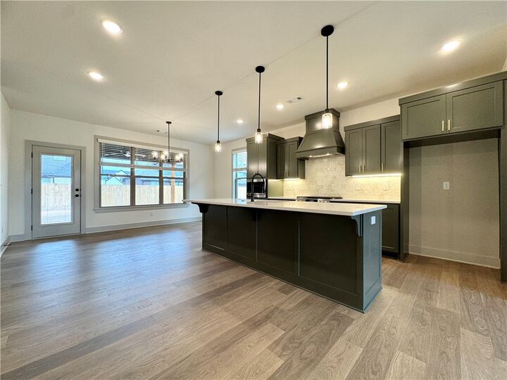 Property Photo:  4802 SW Scarlet Oak Street  AR 72713 