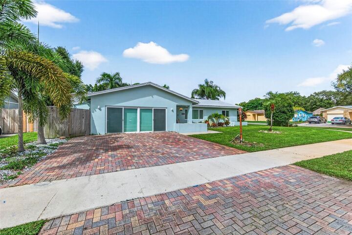 Property Photo:  6847 NW 27th Way  FL 33309 