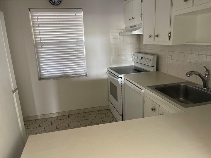 Property Photo:  1005 Country Club Drive 205  FL 33063 