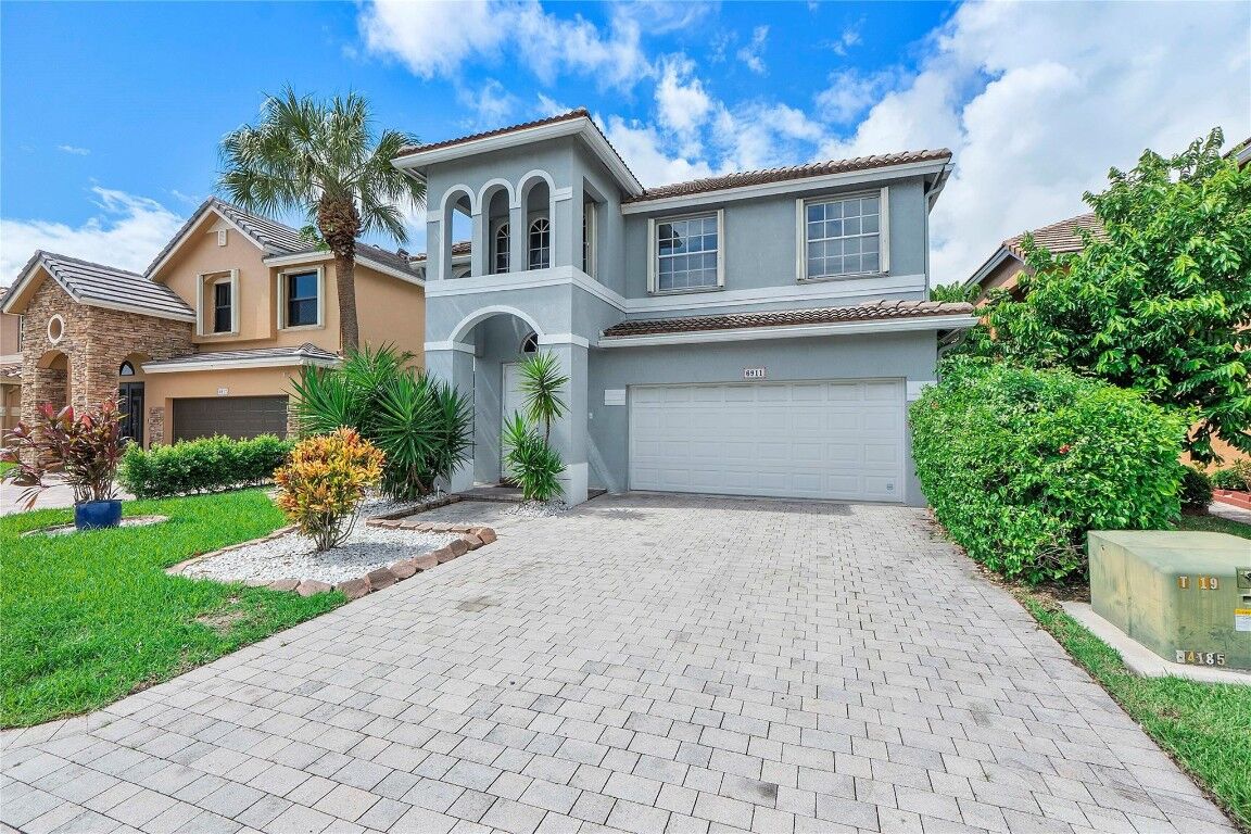 Property Photo:  6911 Sea Daisy Drive  FL 33462 