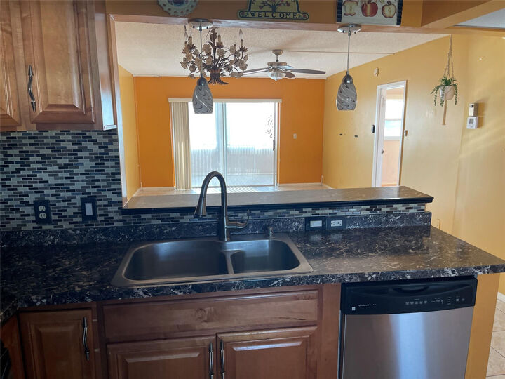 Property Photo:  1025 Country Club Drive 407  FL 33063 