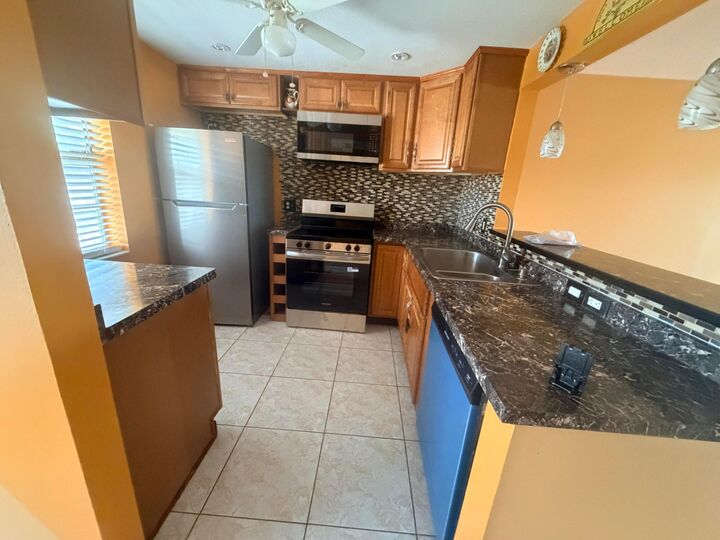 Property Photo:  1025 Country Club Drive 407  FL 33063 