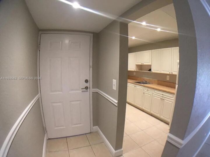 Property Photo:  9441 SW 76th St V33  FL 33173 