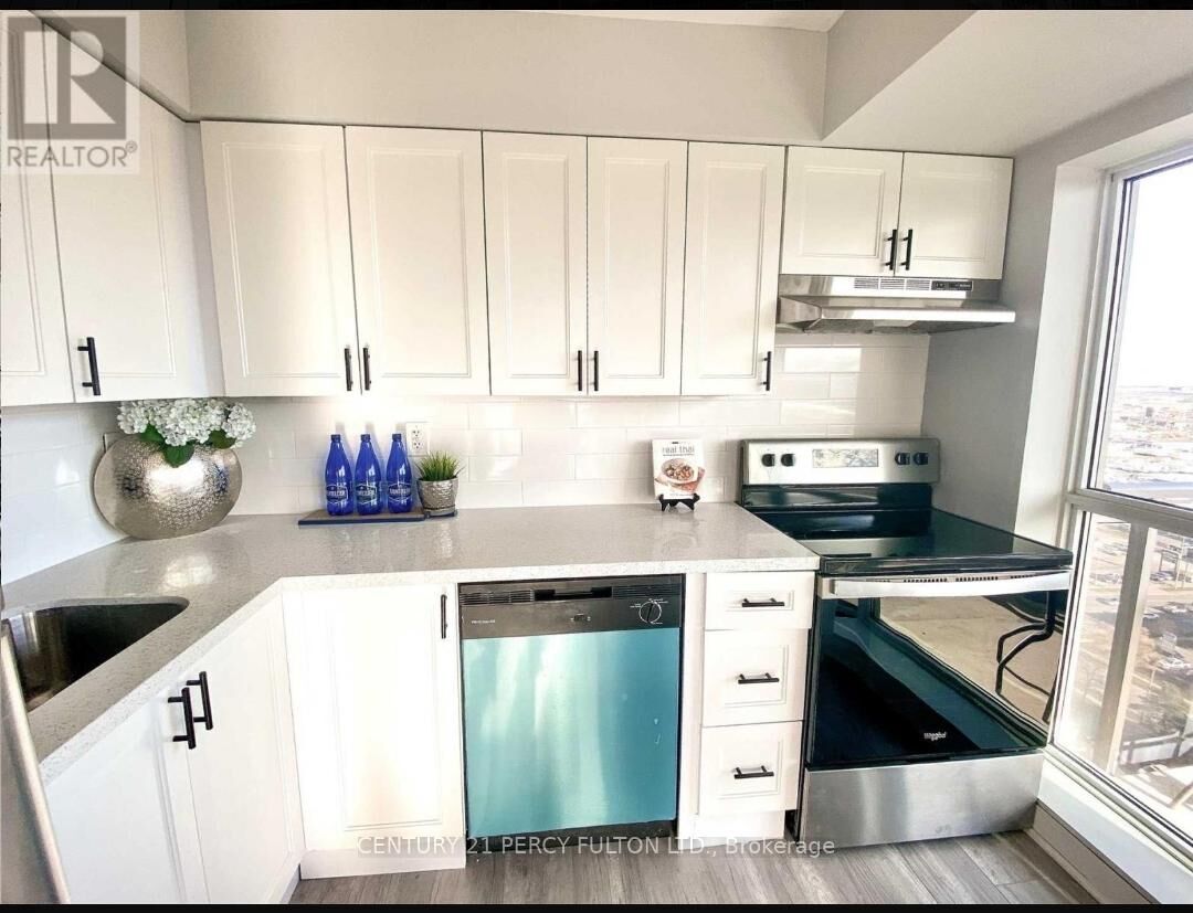 Property Photo:  215 Queen Street E 2003  ON L6Y 1M6 