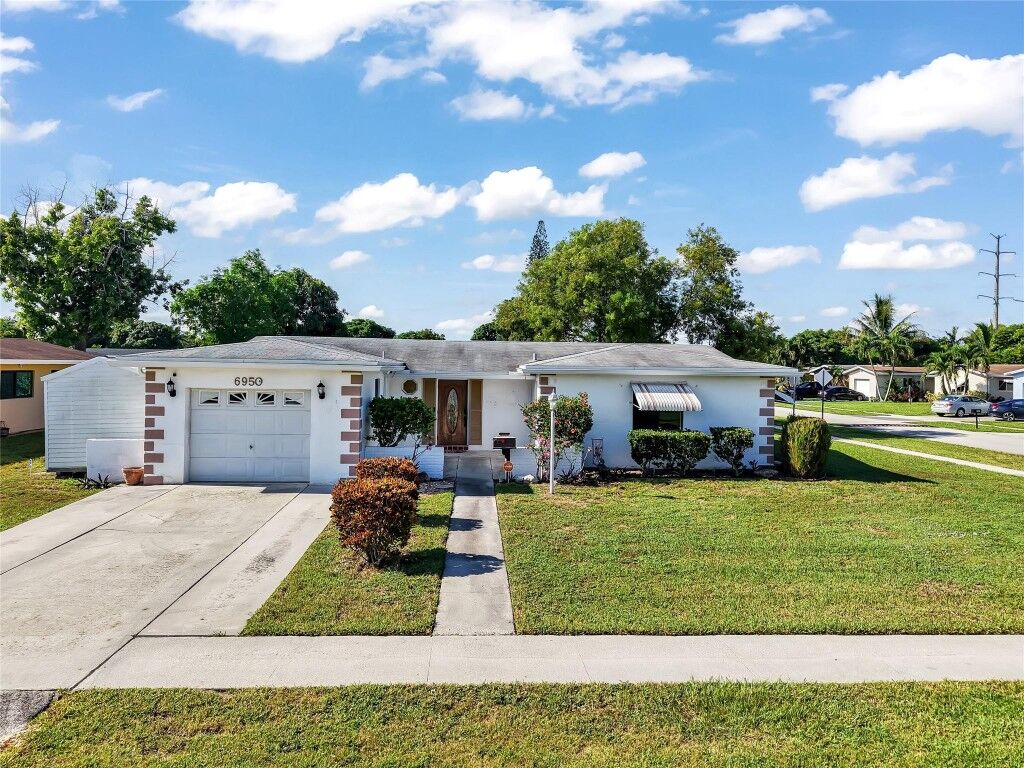 Property Photo:  6950 SW 9th Place  FL 33068 