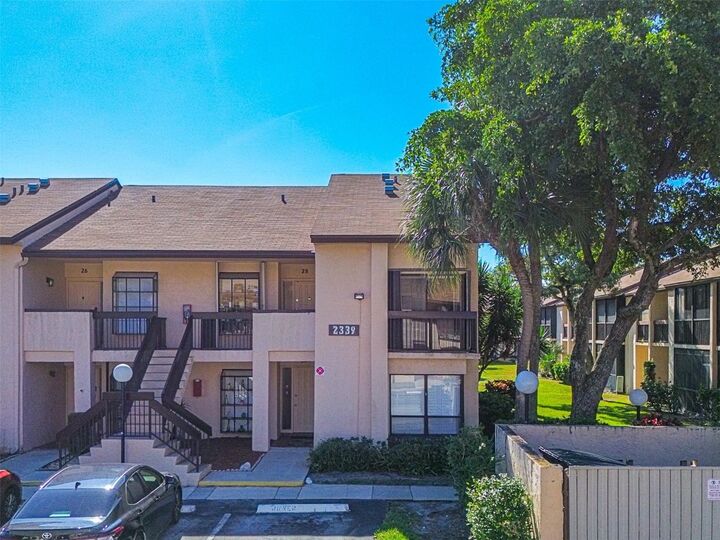 Property Photo:  2339 SW 15th Street 28  FL 33442 