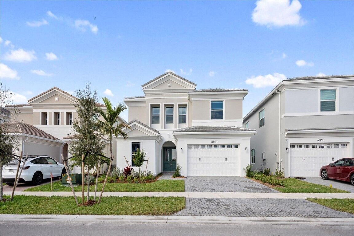Property Photo: 14941 Redcove Place FL 33470