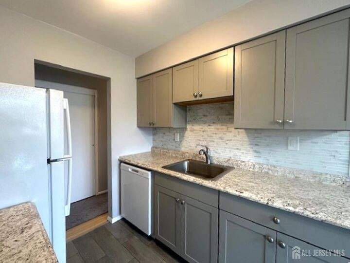 Property Photo:  61 Stonehurst Boulevard F  NJ 07728 