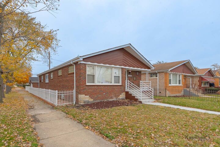Property Photo:  300 E 107th Street  IL 60628 