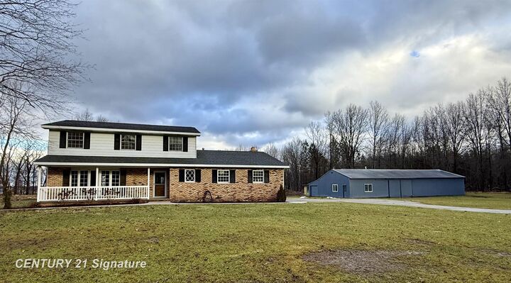 Property Photo:  11890 Swan Creek Road  MI 48609 
