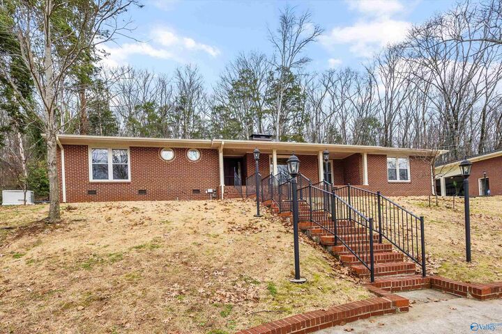 Property Photo:  409 Four Mile Post Road SE  AL 35802 