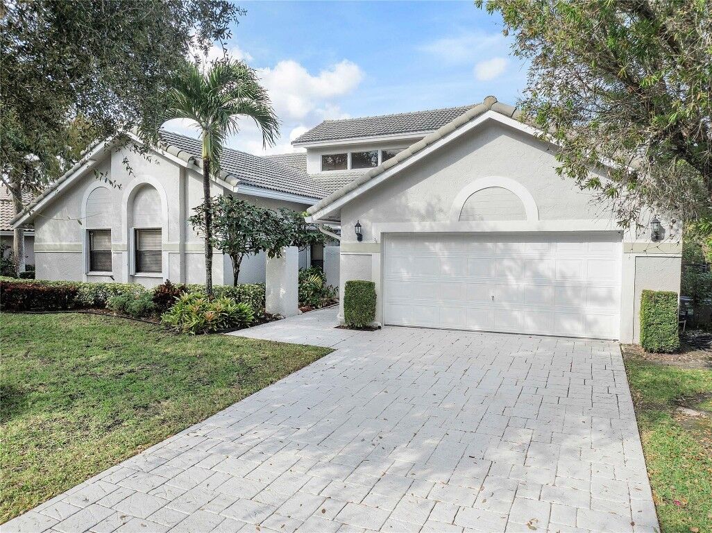 Property Photo:  8977 NW 53rd Manor  FL 33067 