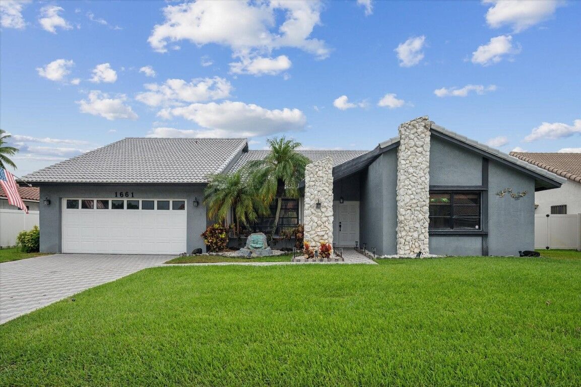 Property Photo:  1661 NW 99th Avenue  FL 33322 