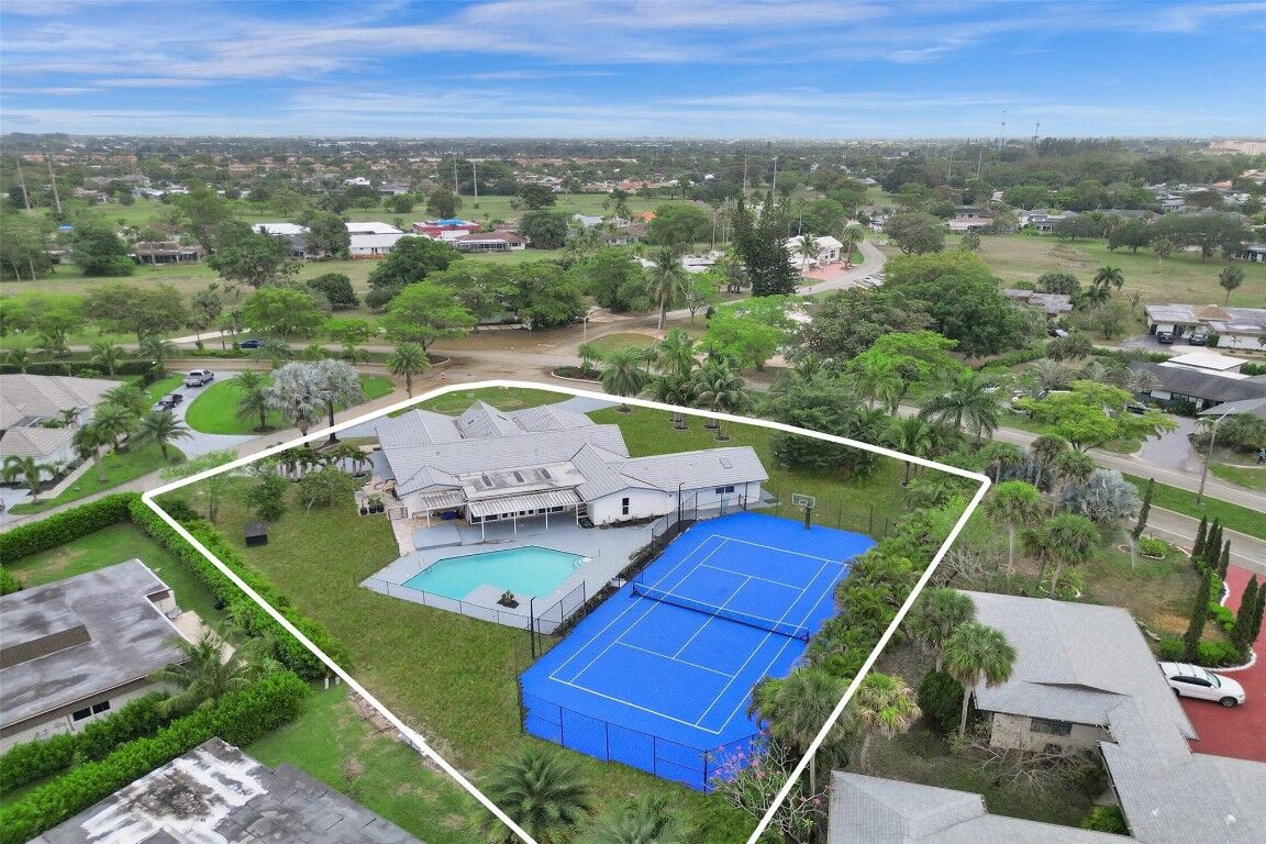 Property Photo:  4915 Woodlands Boulevard  FL 33319 