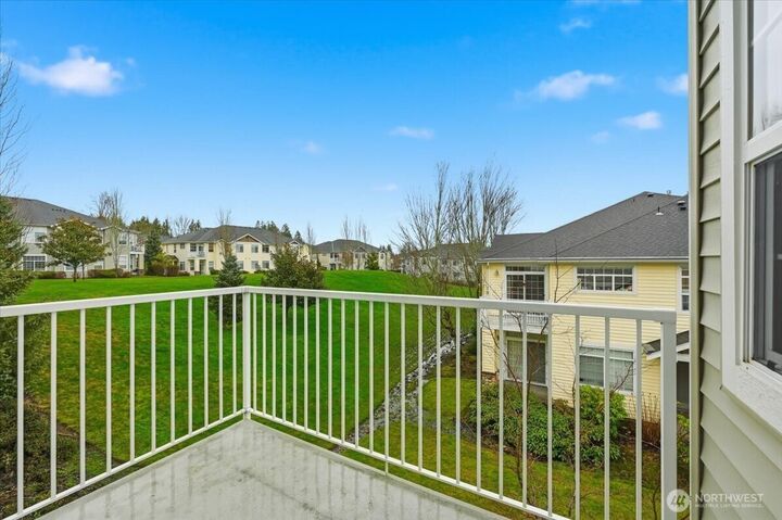 Property Photo:  1855  Trossachs Boulevard SE 1904  WA 98075 