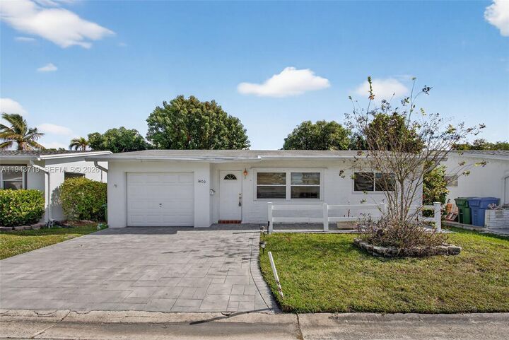 Property Photo:  1400 NW 69th Ave  FL 33063 