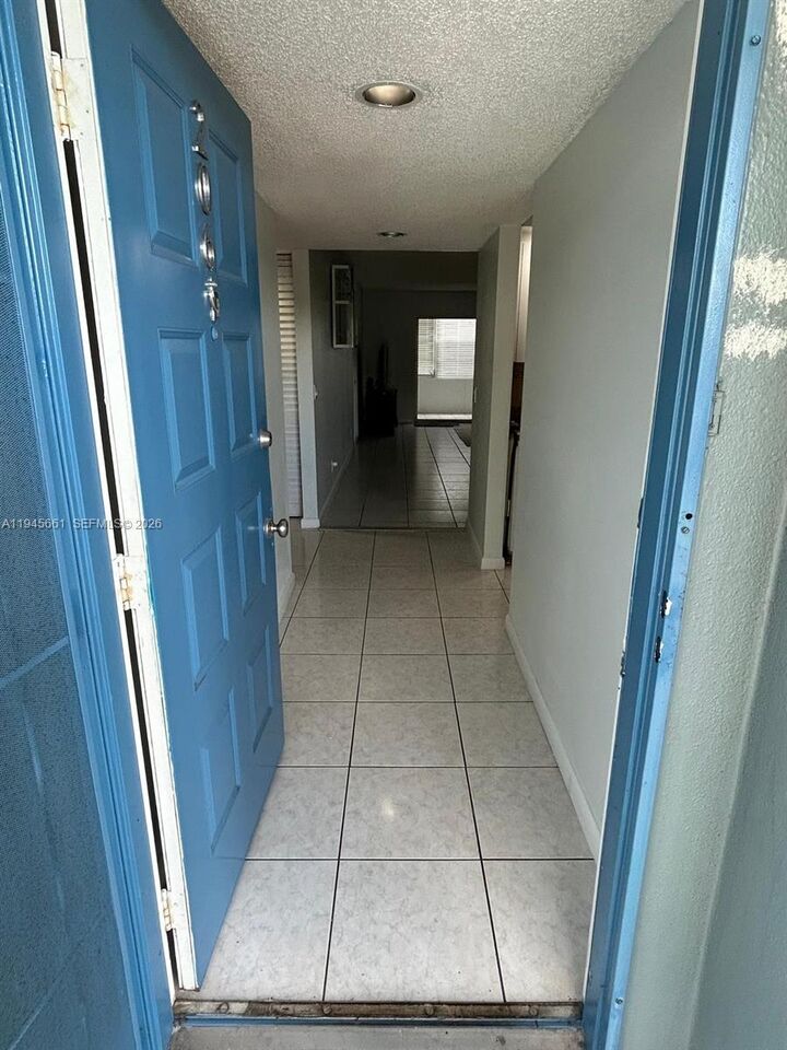 Property Photo:  1501 SW 134th Way 206D  FL 33027 