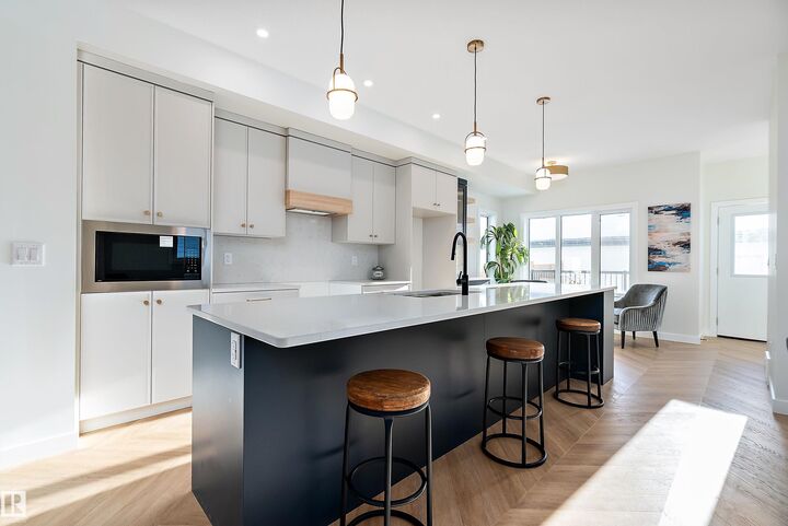 Property Photo:  7509 Rowland Road NW  AB T6A 3W4 