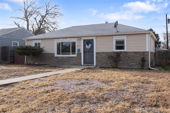 Property Photo:  1345 Dallas Street  CO 80010 