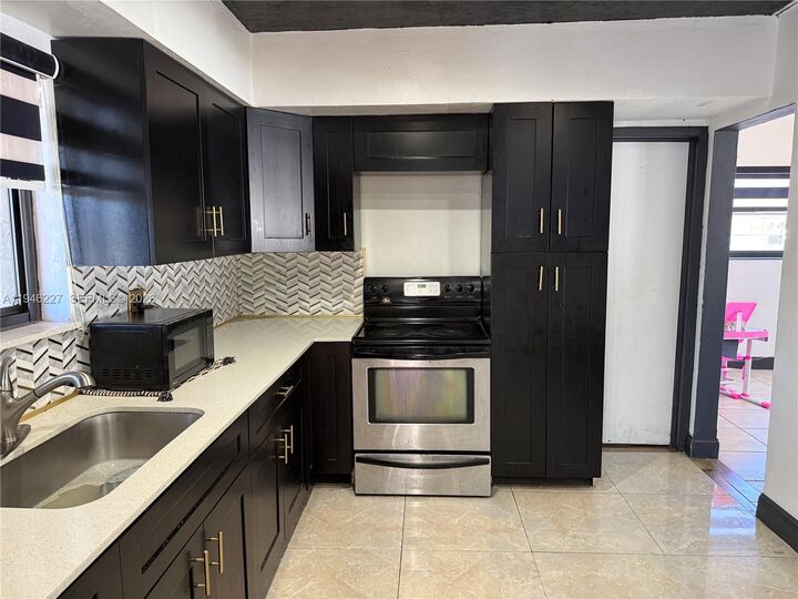 Property Photo:  1241 NW 196th St  FL 33169 