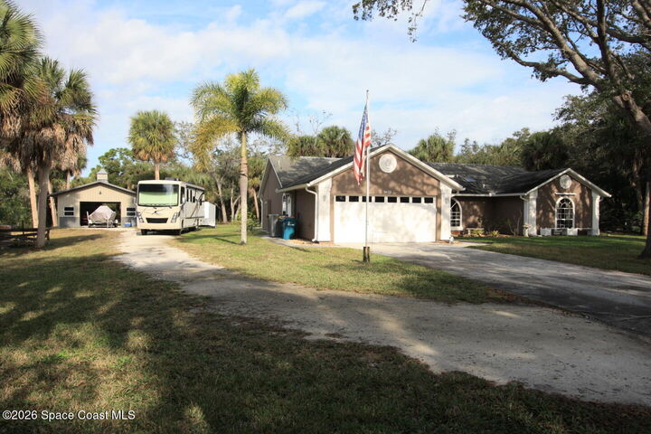 Property Photo: 9673 Fleming Grant Road FL 32976