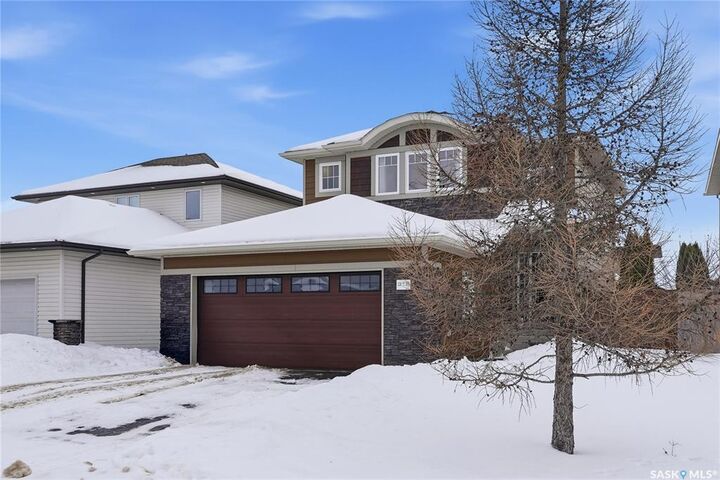 Property Photo:  319 East Hampton Boulevard  SK S7R 0A5 