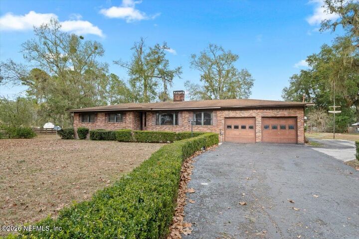 Property Photo:  17995 Lem Turner Road  FL 32218 