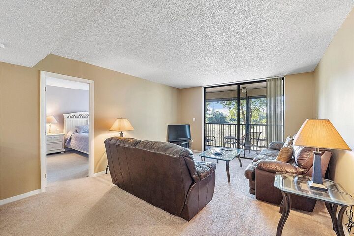 Property Photo:  5530 NW 44th Street 216 C  FL 33319 