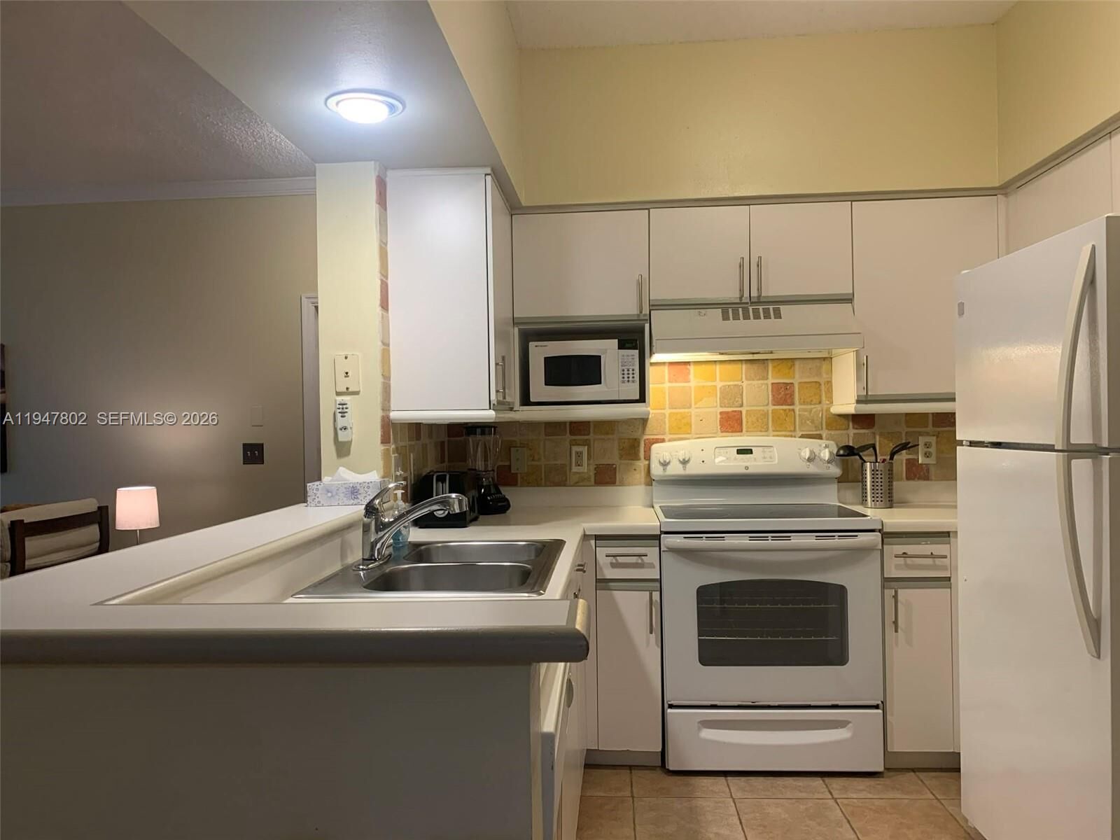 Property Photo:  3235 NE 184th St 11201  FL 33160 