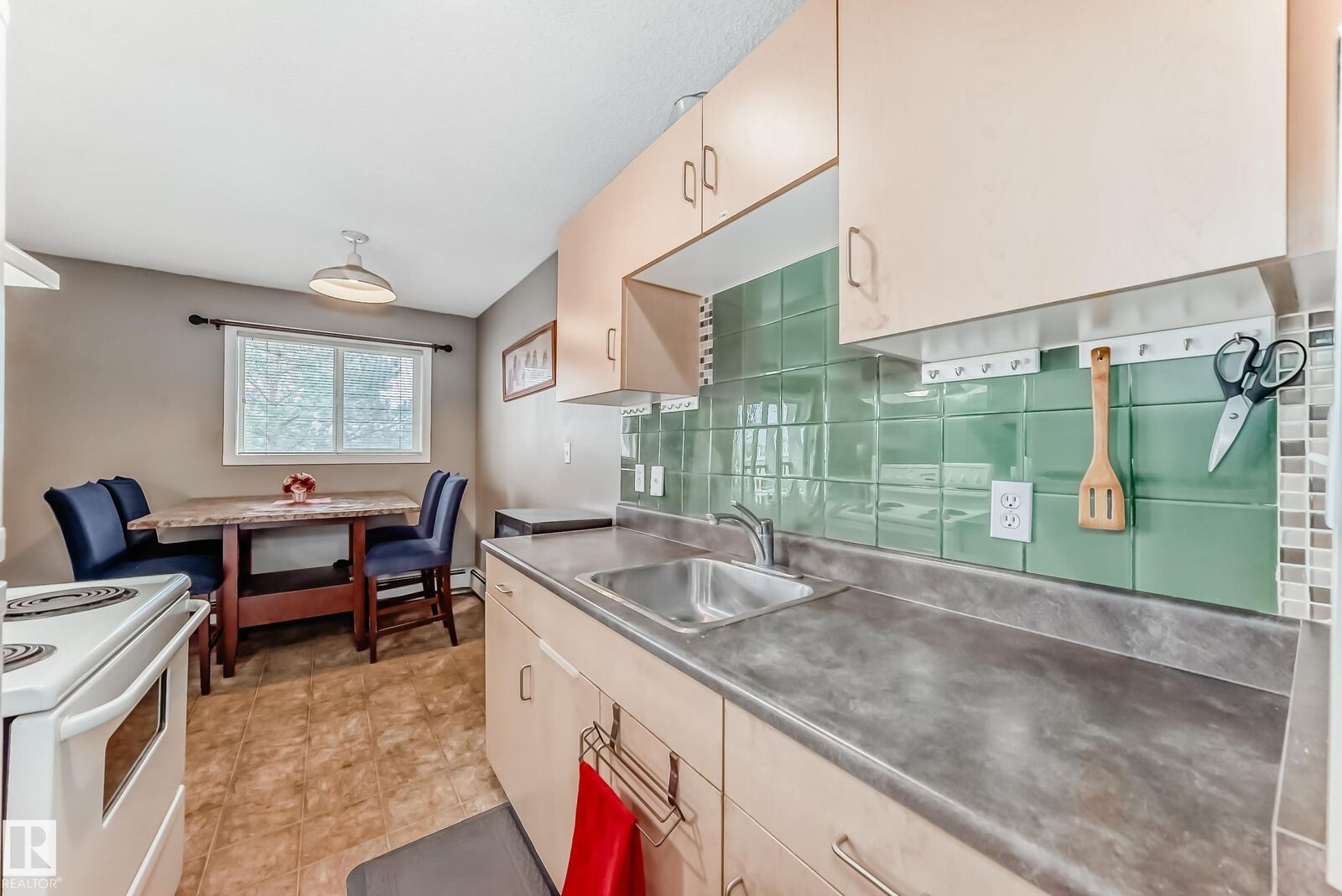 Property Photo: 12710 127 Street NW 305 AB T5L 1A5