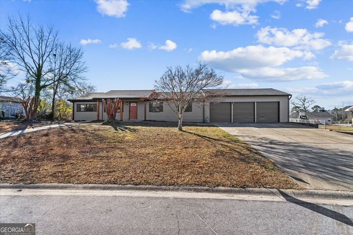 Property Photo:  747 Briarwood Road SW  GA 30094 