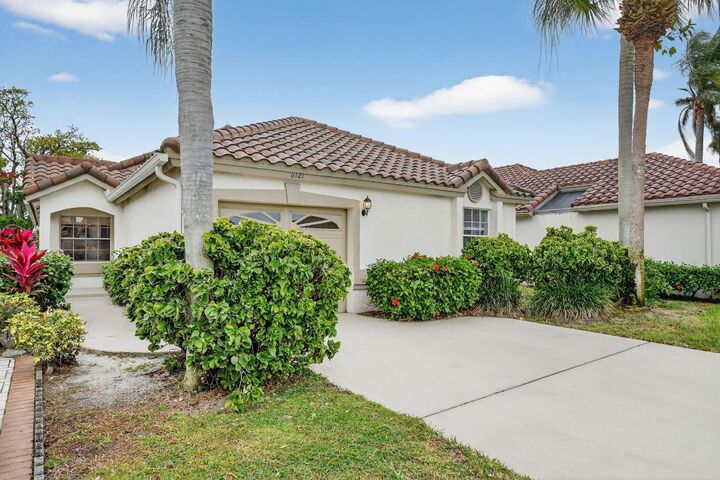 Property Photo:  6121 Bay Isles Drive  FL 33437 