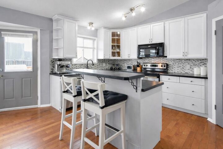 Property Photo:  230 Aspen Creek Crescent  AB T1P 1X8 