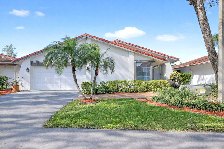 Property Photo:  661 Deer Creek Hollows Circle  FL 33442 