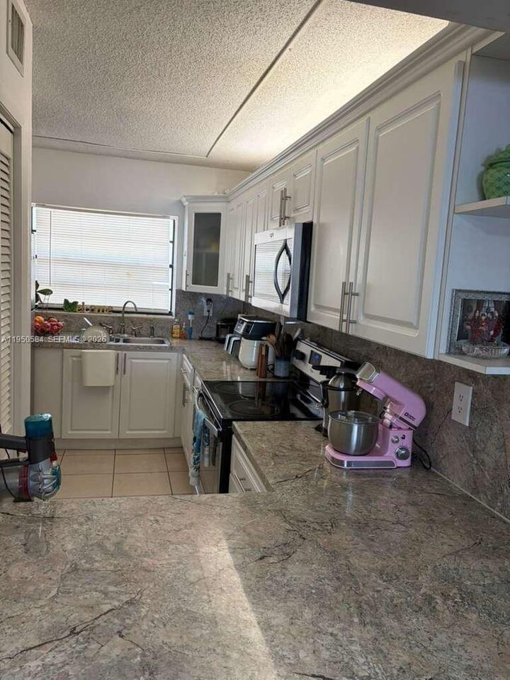 Property Photo:  5840 W 26th Ave 5840  FL 33016 