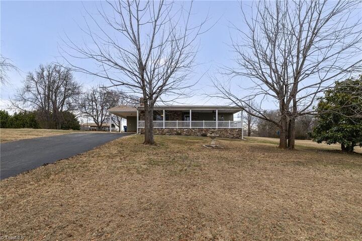 Property Photo:  2465 Amostown Road  NC 27046 