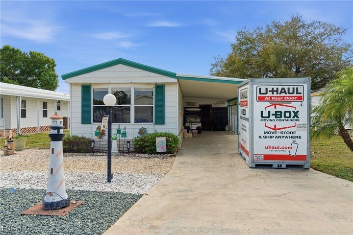 Property Photo: 9838 Sugarberry Way FL 33905