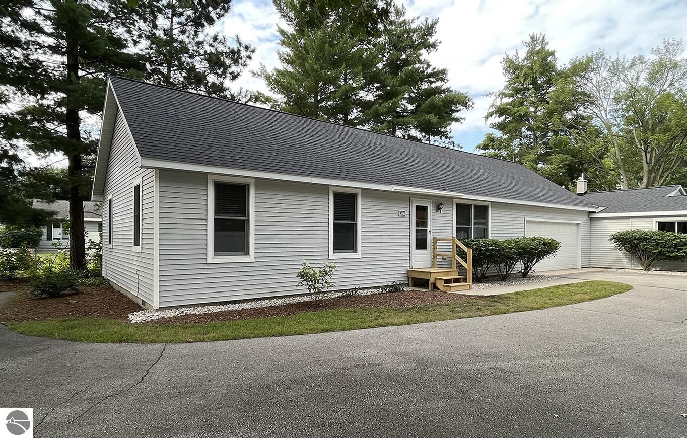 Property Photo:  837 Fern Street  MI 49686 