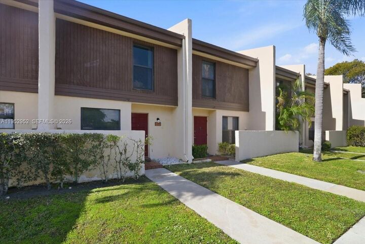 Property Photo:  1270 NW 99th Ave 60  FL 33024 