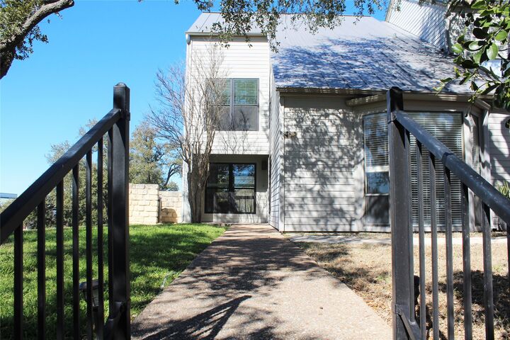 Property Photo:  101 World Of Tennis Square  TX 78738 