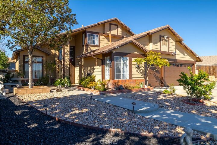 Property Photo:  24780 Suburban  CA 92551 