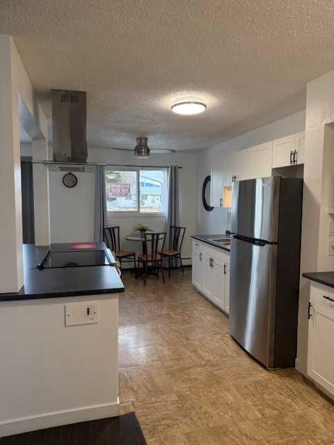 Property Photo: 11114 Hoppe Avenue 202 AB T0E 0Y0