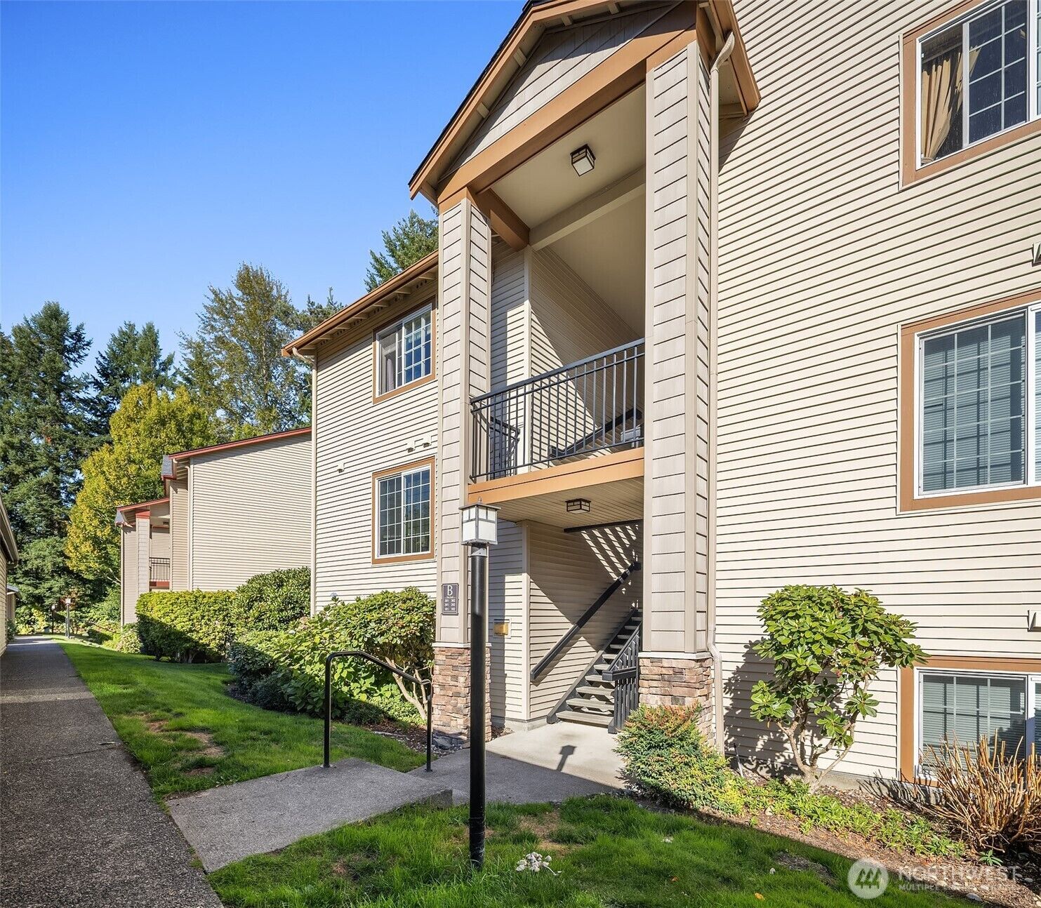Property Photo:  25025 SE Klahanie Boulevard B101  WA 98029 