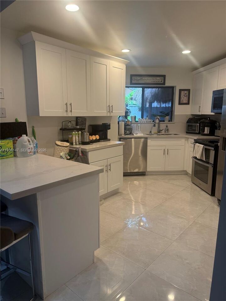 Property Photo:  11021 SW 13th St  FL 33025 